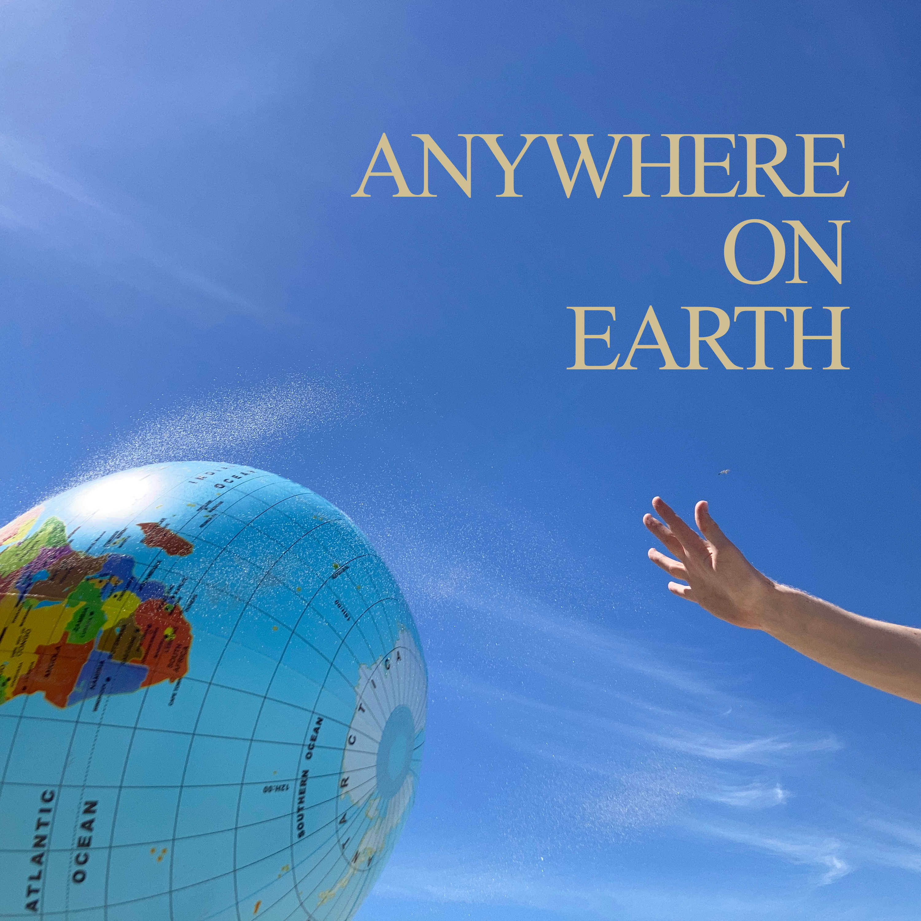 Anywhere on Earth album cover showing serif text in the northeast quadrant. Southern half of the art shows a large earth map globe beach ball just after being hit by a raised arm.
